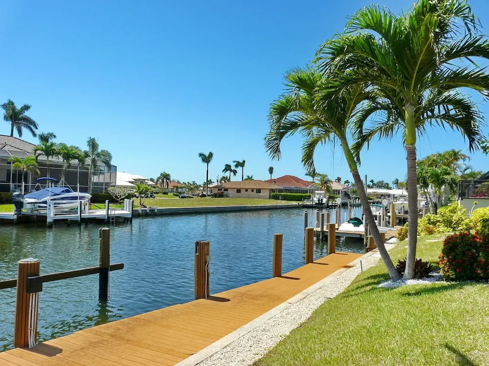 Pet-friendly waterfront home with heated pool and spa