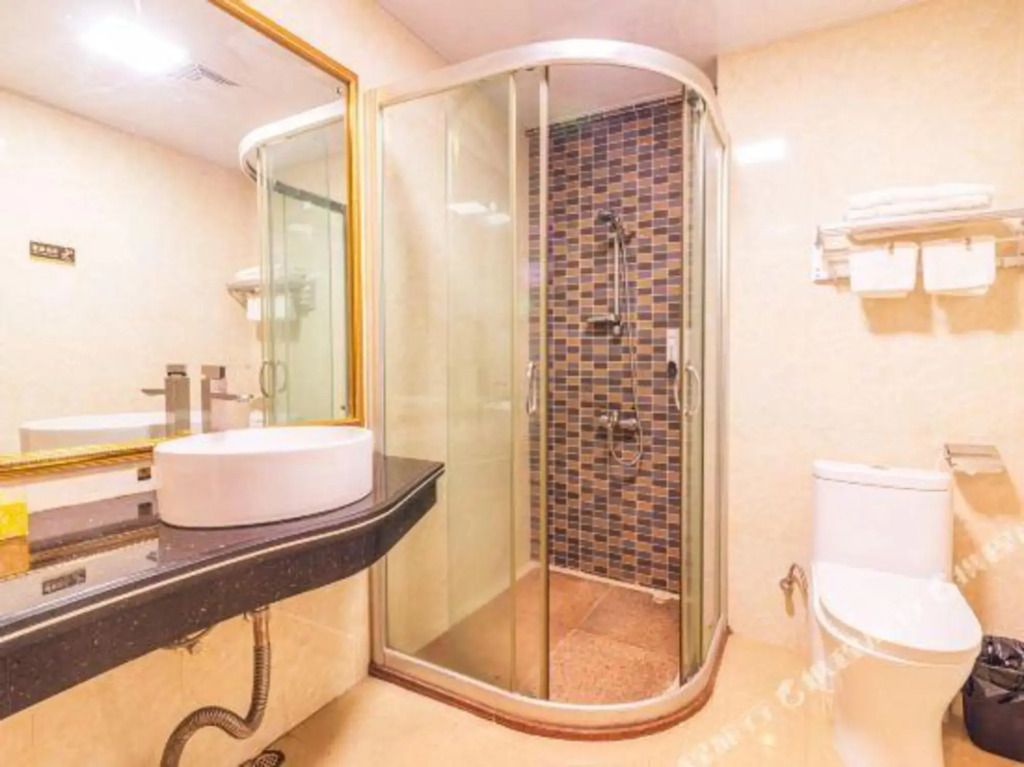 Youge Shangpin Hotel (Xinxing Times Square Bus Station)