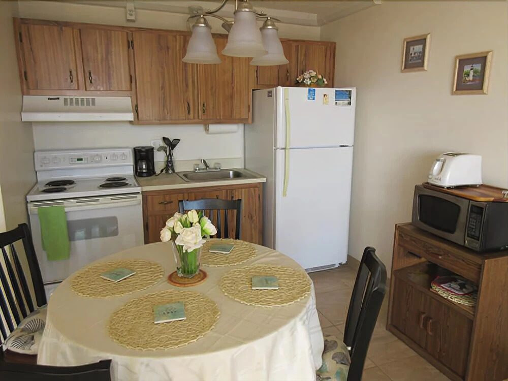 Estero Beach and Tennis 701A by RedAwning