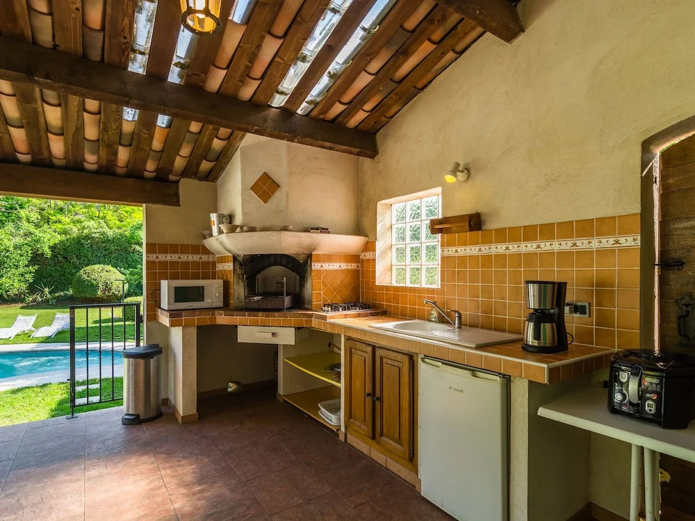 Sleep in former train station with beautiful pool and enclosed grass garden