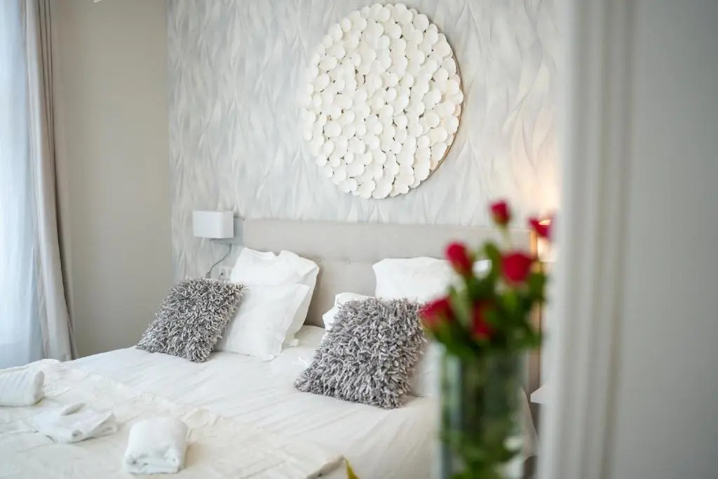 Hôtel Échappée en Baie - Chambres climatisées -Parking privé gratuit dont forfaits bornes électriques réservable