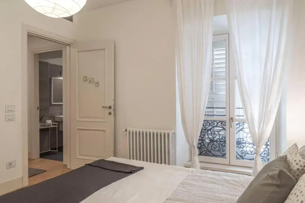 Palazzo Tergesteo Tirabora Suite Apartments