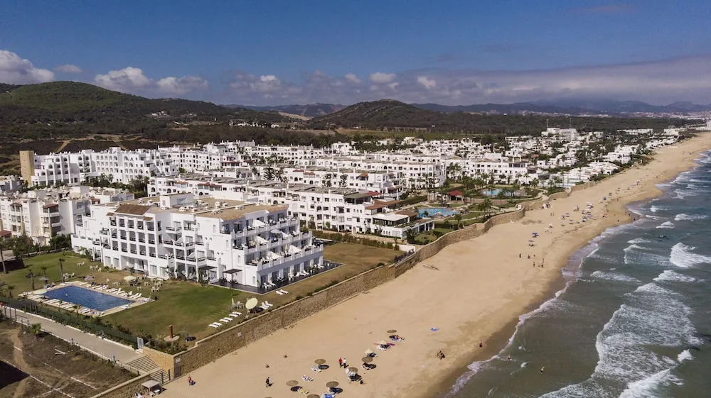 Отель Playa Del Pacha Suites