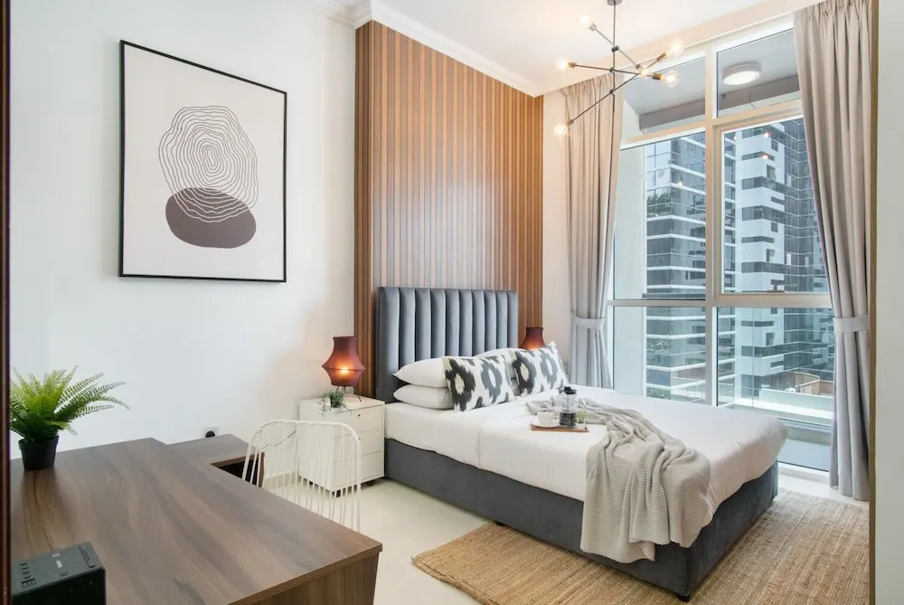 Luxe Apartments near Dubai Mall, Burj Khalifa - Pool, Gym, & Parking by Sojo Stay
