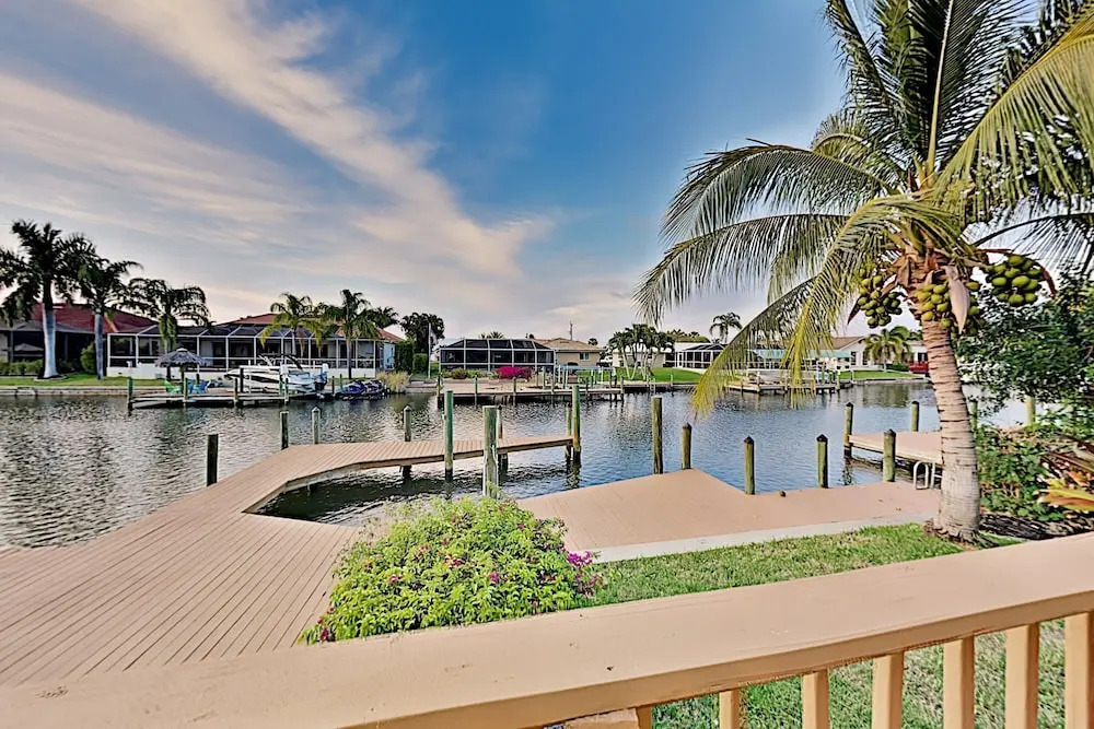 Canal-front W/ Boat Dock & Screened Pool 4 Bedroom Home