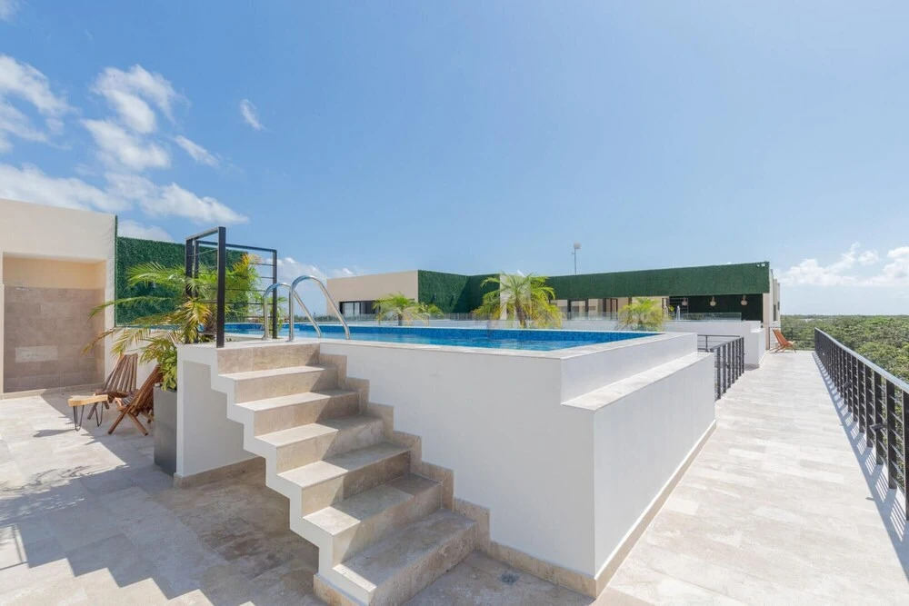 Spacious 2 BR Aldea Zama Private Pool Movie Cinema Gym