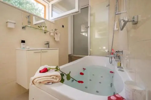 Uniquely designed Villa Ivana with outdoor Jacuzzi nearby the pebble Banje beach at the Island of Solta
