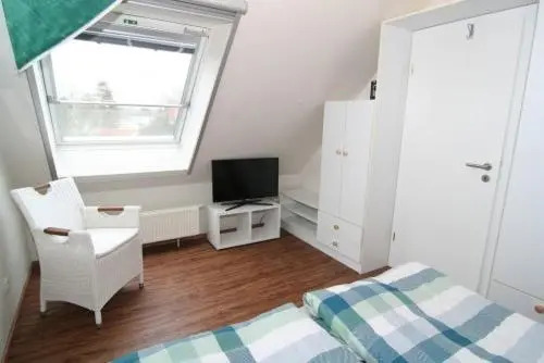 Ferienwohnung "Windflüchter", Gartenweg 5