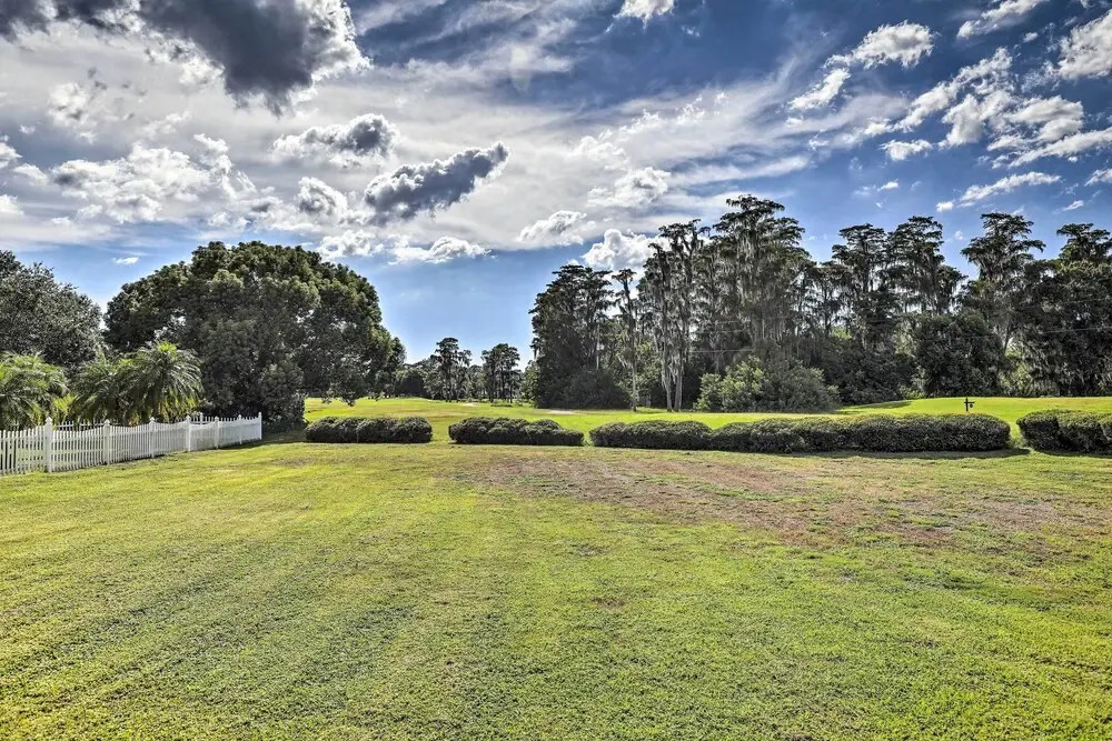 Palm Harbor Home w/ Pool & Golf Course Views!