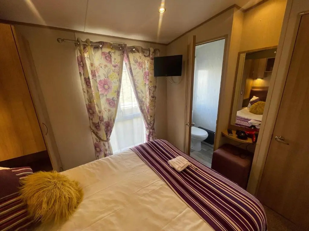 Lakeside Retreat 1 with hot tub, private fishing peg situated at Tattershall Lakes Country Park