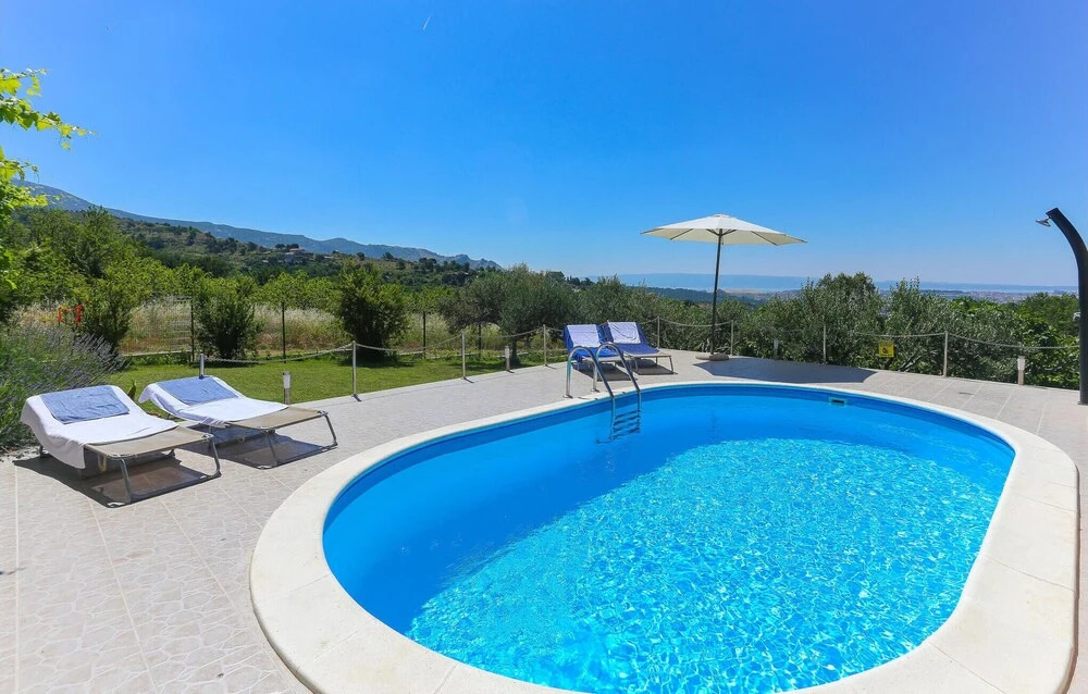 Holiday Home Rupotina with a large yard, pool and a beautiful view