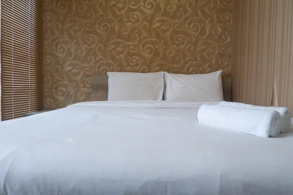 Cozy and Minimalist Studio Apartment at Tamansari Papilio By Travelio