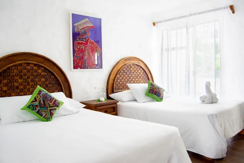 Четырёхместный люкс в Petit Hotel Pilitas