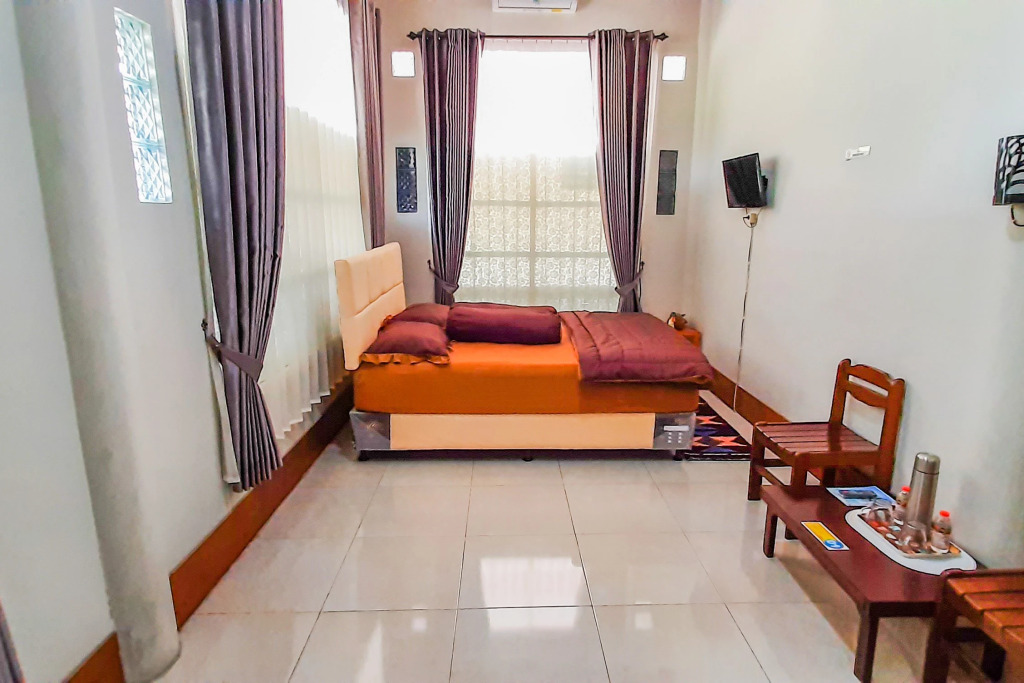OYO 90374 Penginapan Dewe Syariah