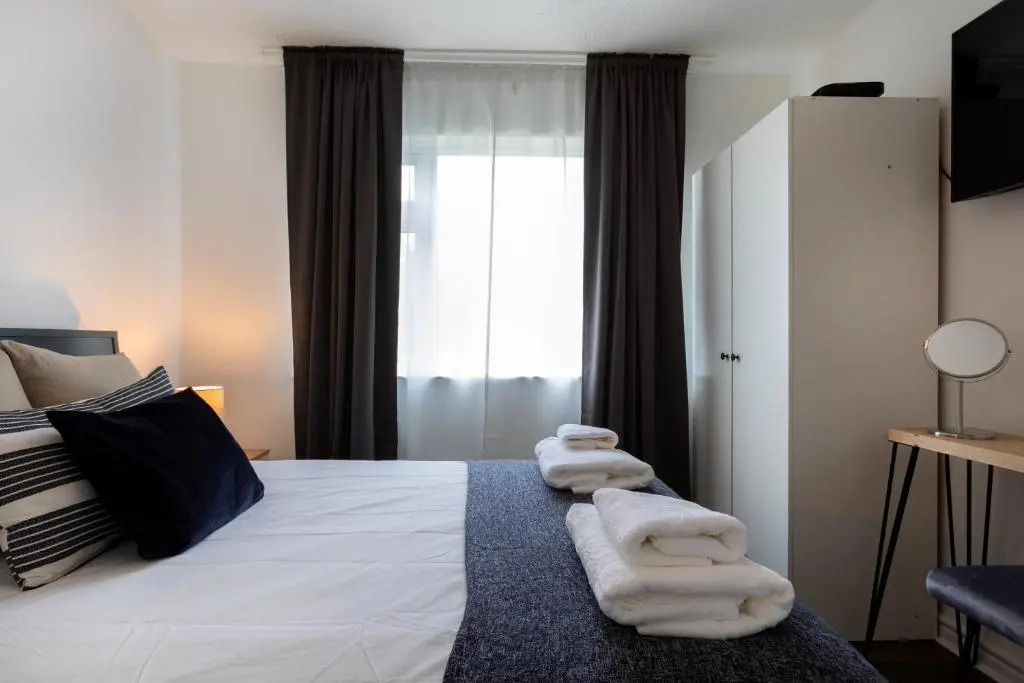 1-Bedroom Apartment with a Private Garden, beach 5-min walk