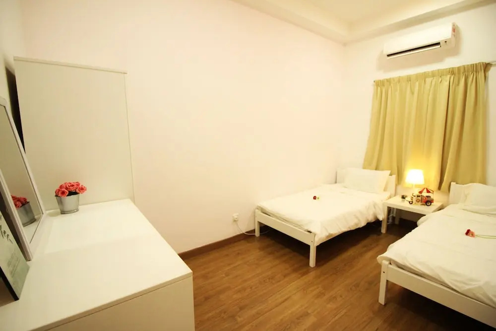 Sentrio Suites @ City Center by HnHCozy