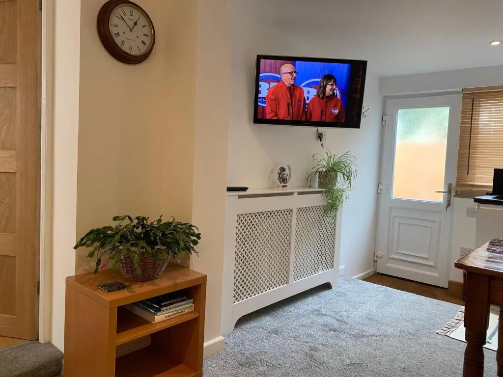 One bedroom self contained annex with own bathroom, sitting room and kitchenette