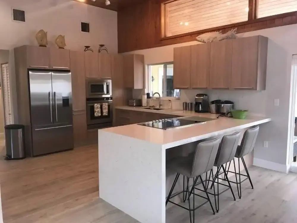 Beautiful Canal Front Home With Above Ground Pool, Dock And Fish Cleaning Station 4 Bedroom Home by RedAwning