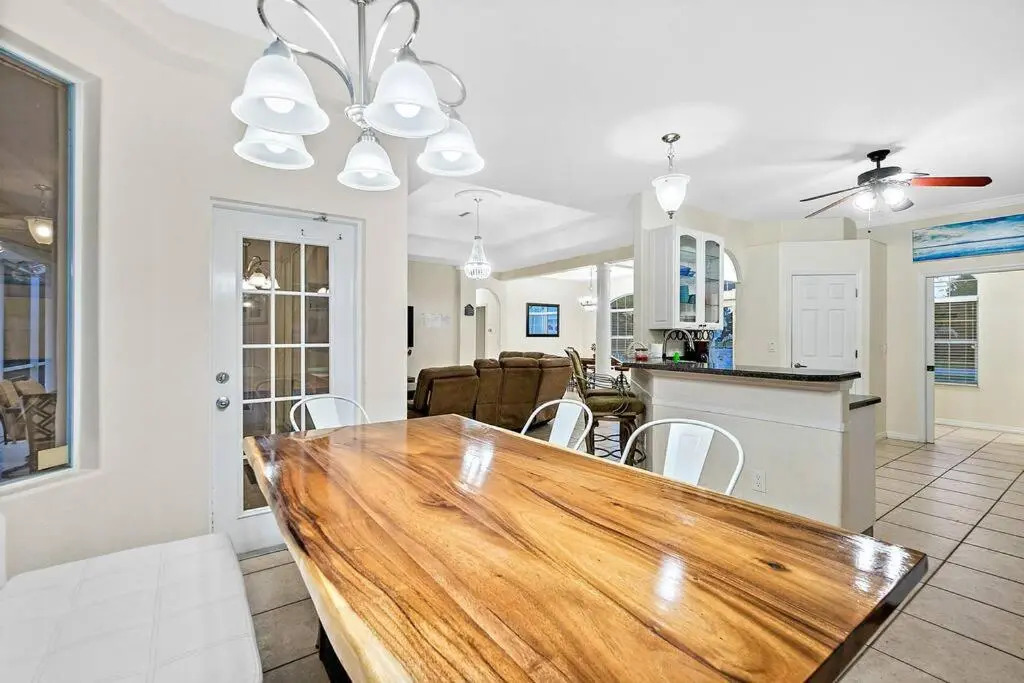 Palm Paradise with Heated Saltwater Pool - 10 min to the Beach