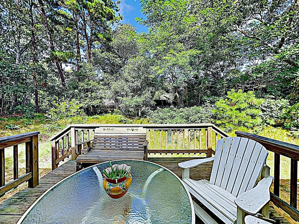 Woodsy Cape Cod Home by RedAwning
