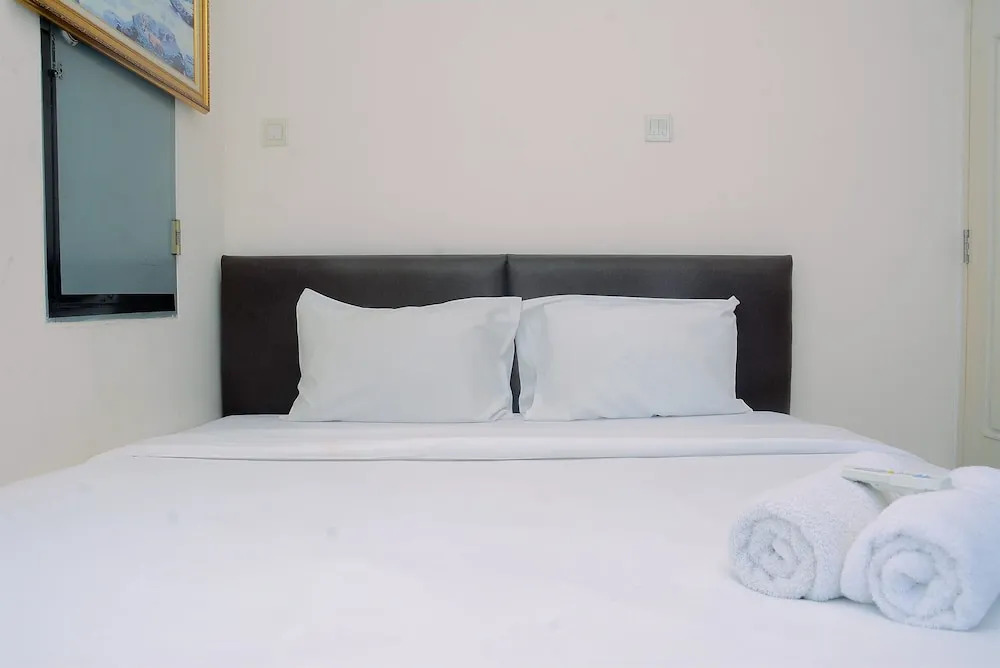 Modern 2 BR Apartment @ FX Residence with City View By Travelio