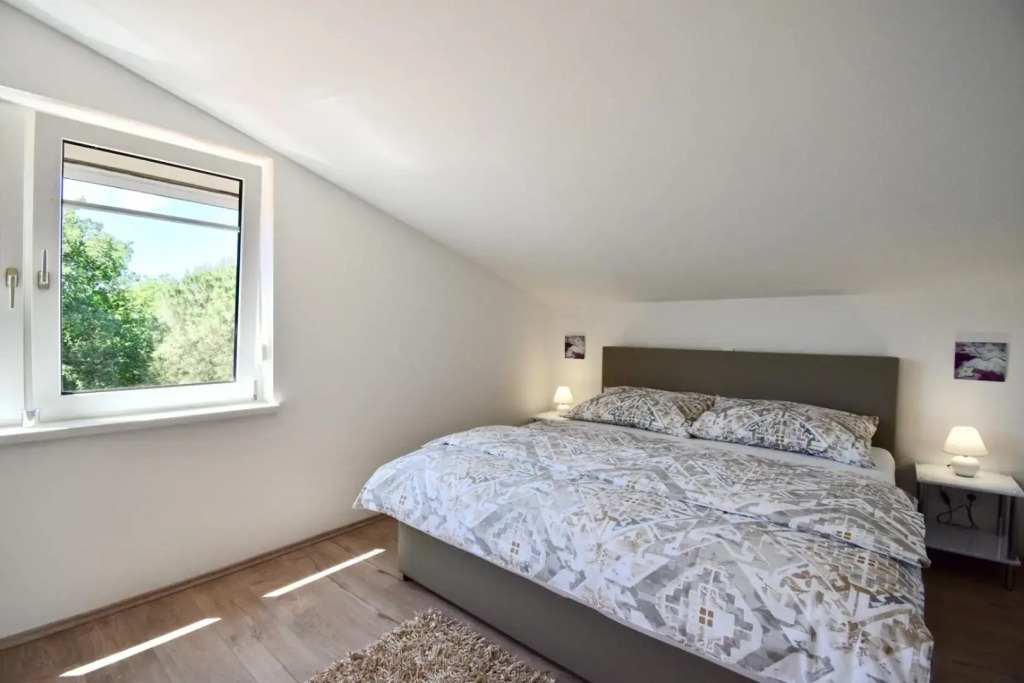 Holiday house with sea view and BBQ grill