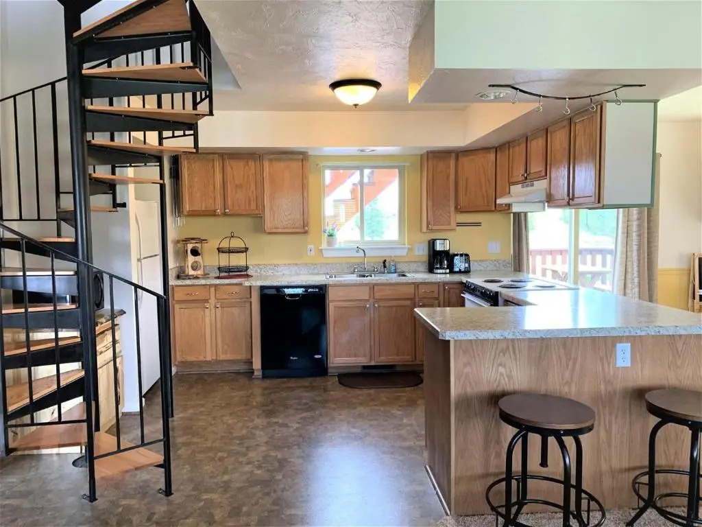Dog Friendly Sans Souci Cabin with Hot Tub by AAA Red Lodge Rentals