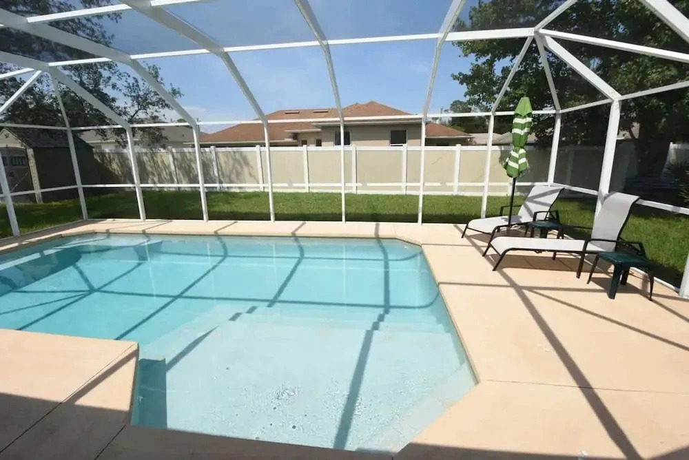 Hidden Oasis Spacious Home With Salt Water Heated Pool Hot Tub Fenced Yard Pets are Welcome