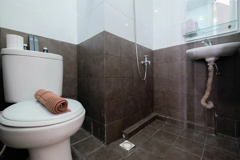 Homey and Relaxing 2BR Green Pramuka Apartment