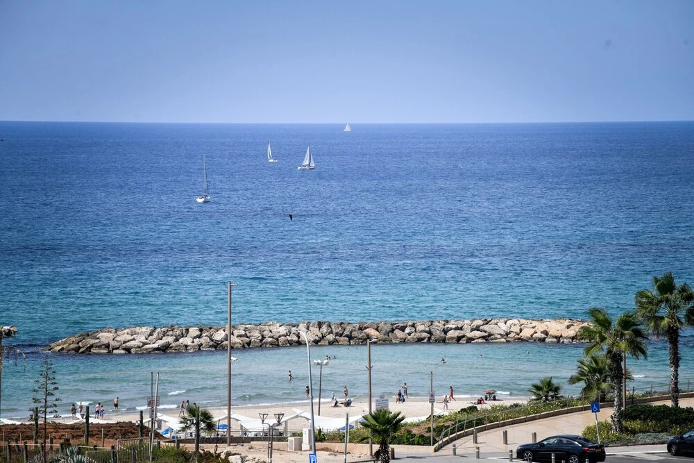 Modern Gem with Stunning Balcony by Sea N Rent