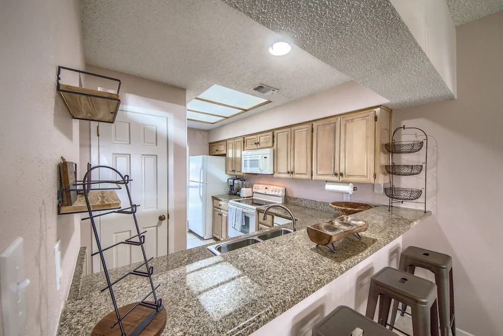 The Iron Cactus on the Comal CW C102 2 Bedroom Condo by RedAwning