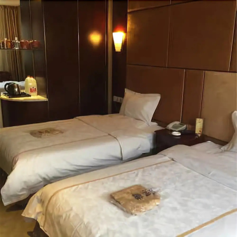 Jiudu Yuegang Business Hotel