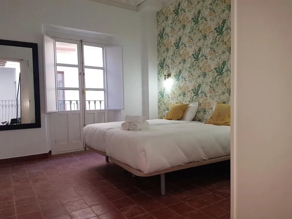 Reservaloen Casa Sevillana
