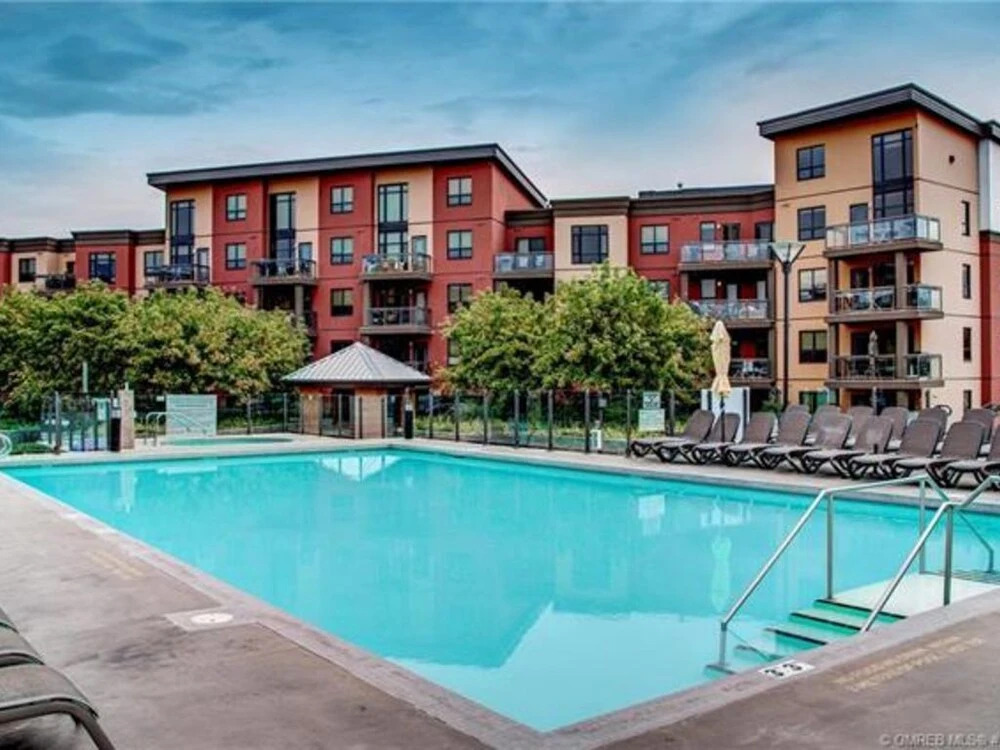 Bright Corner Unit with Lake and Pool Views #543