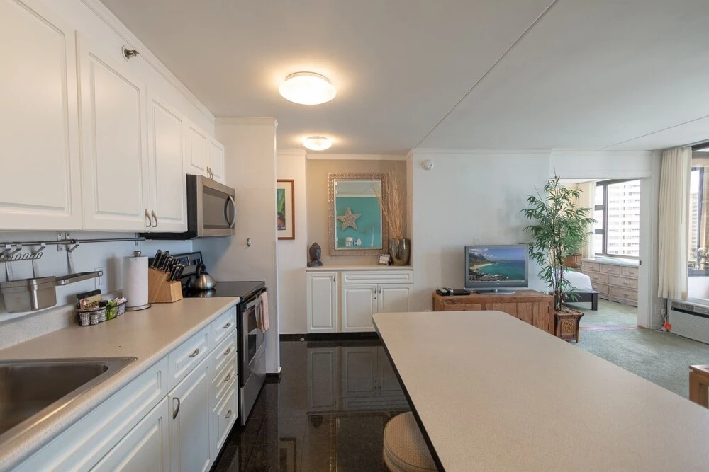 Modern 12th Floor Waikiki Banyan Condo with Partial Ocean Views by Koko Resort Vacation Rentals