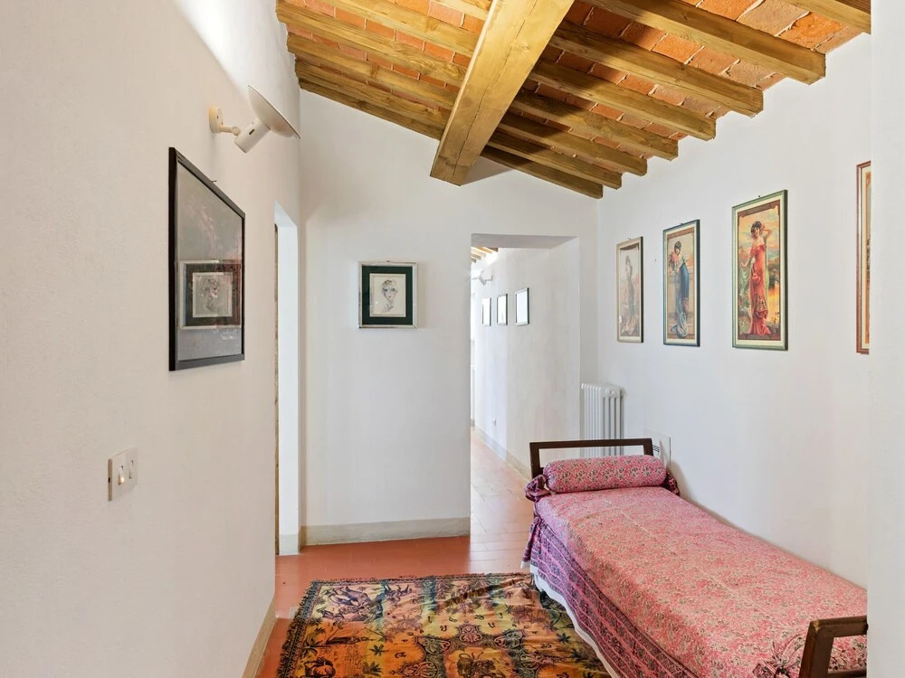 House on the Property Next to an Ancient Villa With a View of the Hills and Pool