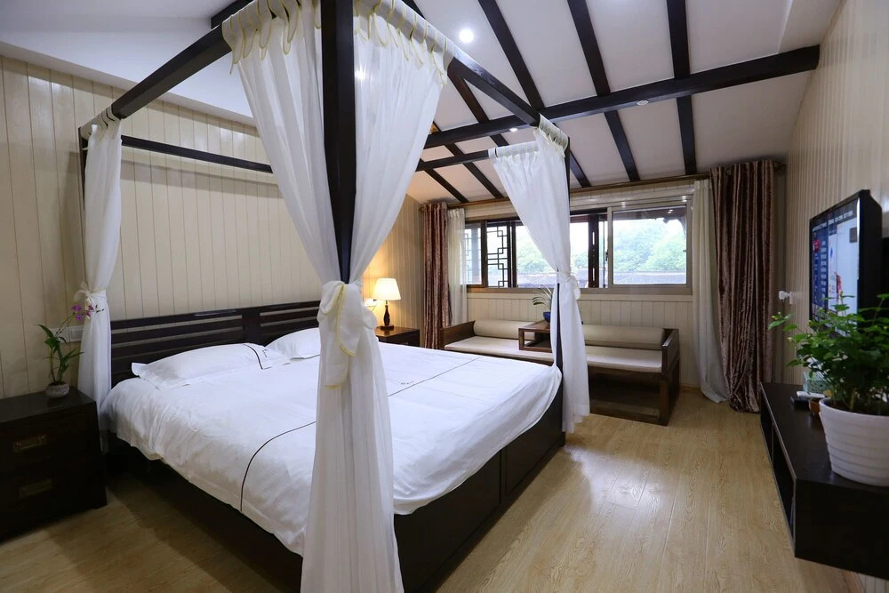Wu Town Sijing Bieyuan Boutique Hostel