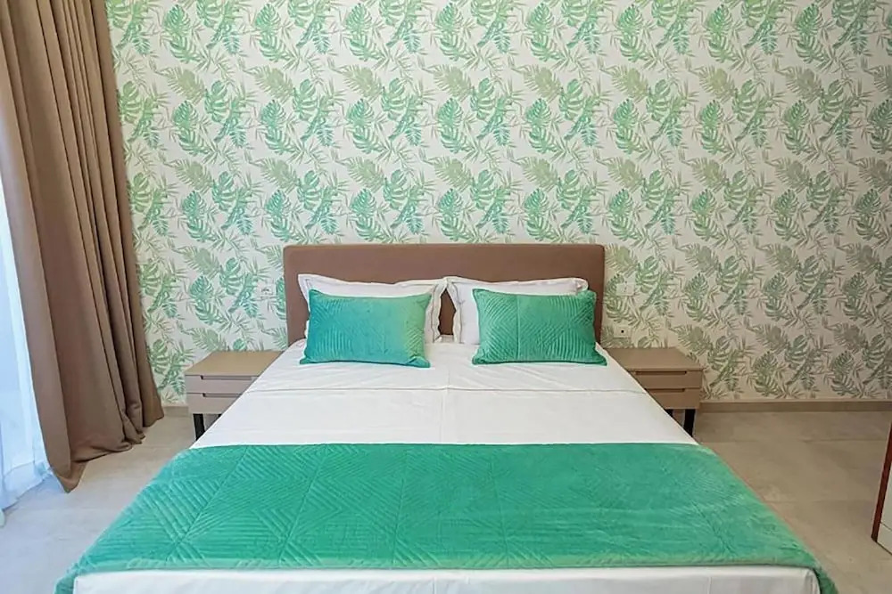 Toto Hotel & Apartments