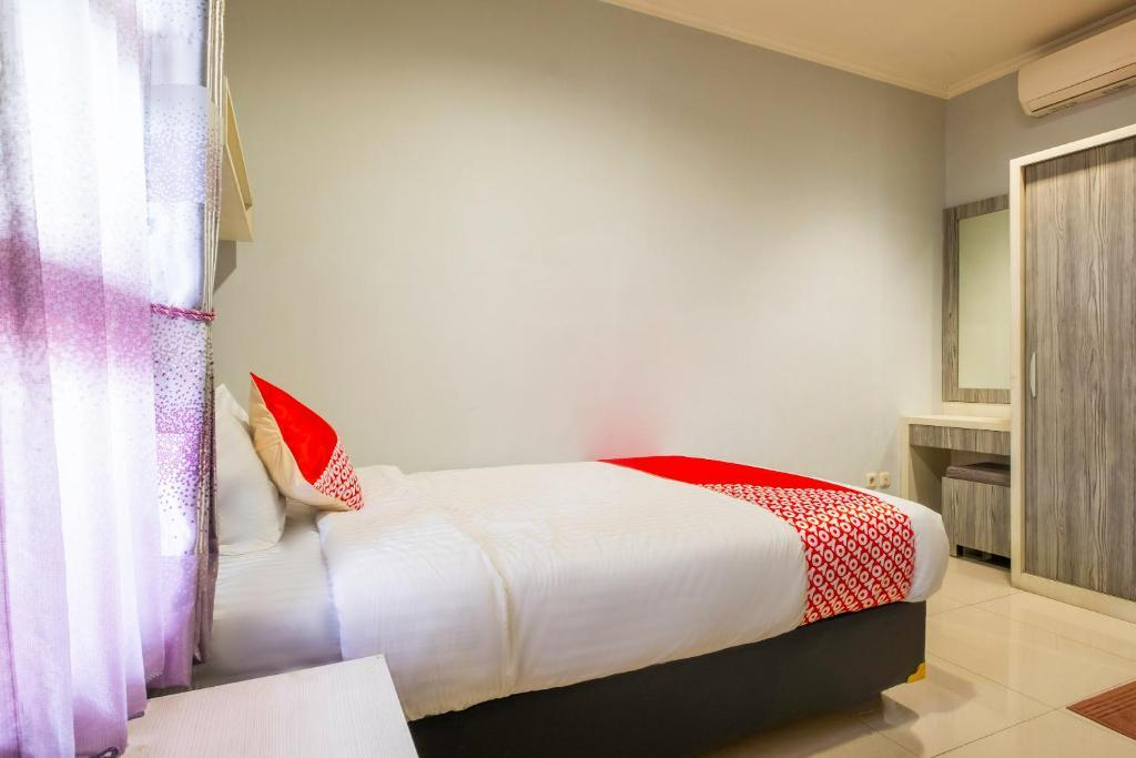 Karins Guesthouse Syariah RedPartner