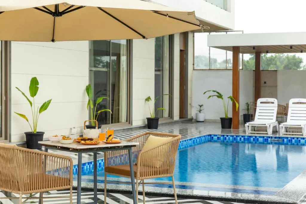 SaffronStays Raaga - luxury 4BR villa with private pool, lawns, gazebos & sweeping Aravalli hill vie