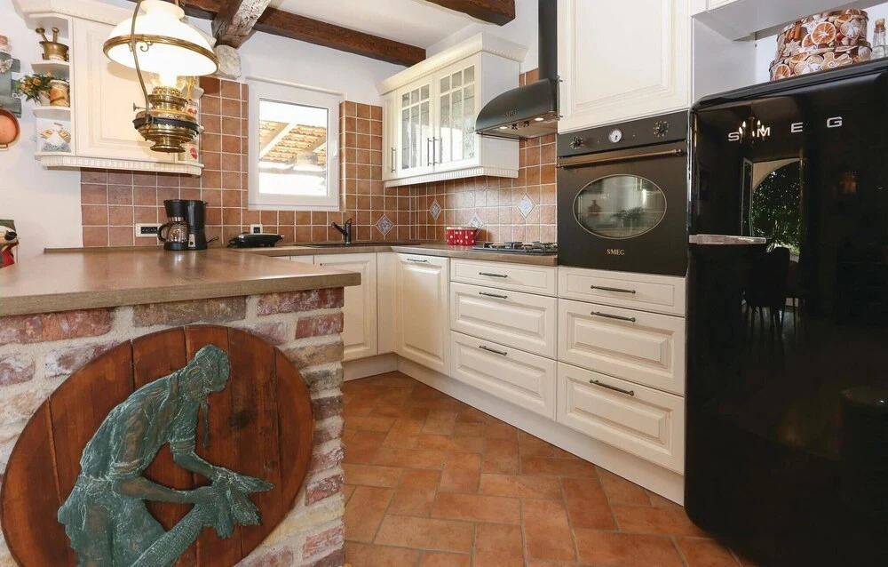 Four-Bedroom Holiday Home In Kastel Sucurac Ii