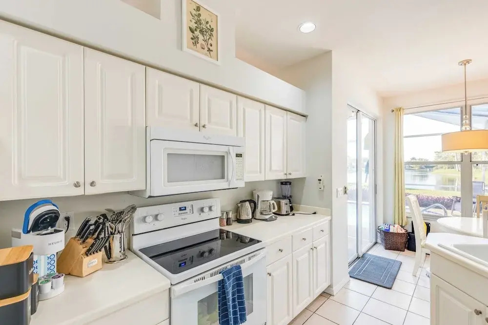 Private Pool, Pond Views, & Bonus Lounge in Gated Naples Community Drive to Dining & Sand