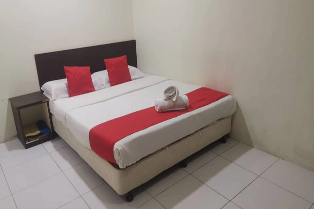 OYO 1104 Q Hotel