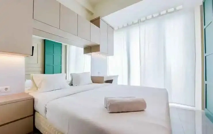 Cozy Stay Studio Apartment at Tree Park City BSD By Travelio