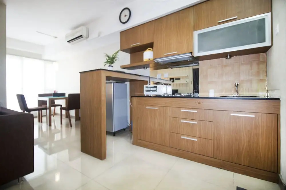 2BR Cozy at Empyreal Epicentrum Apartment By Travelio