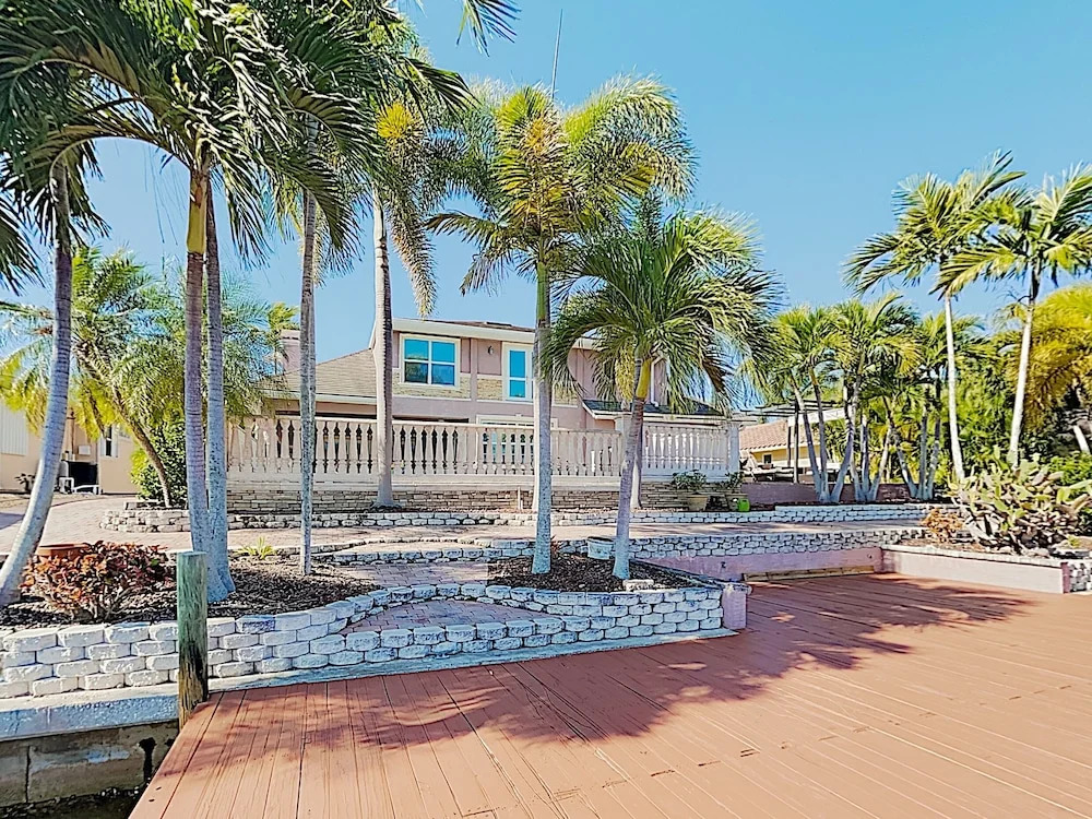 New Listing! European-style On Canal W/ Pool 4 Bedroom Home