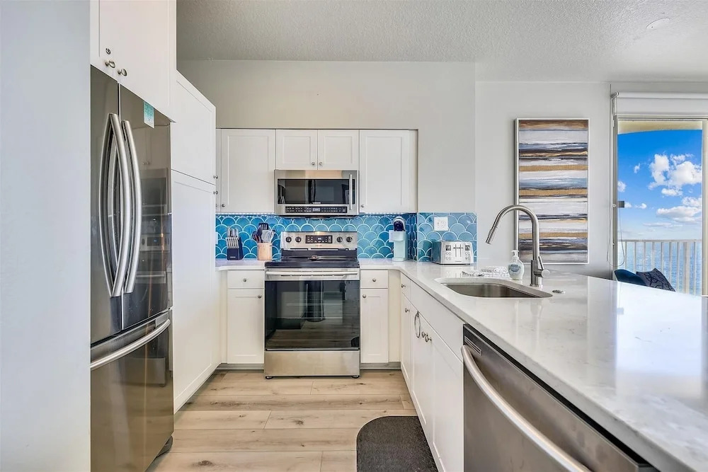 Shores of Panama 2003 - Renovated 2 bedroom, with Bunkroom with a Reserved Parking Space! 2 Condo by RedAwning