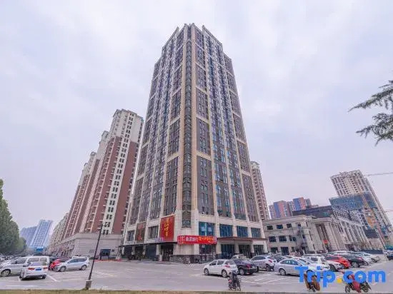 Chengyue Suqi Cinema Light Stay Apartment (Linyi Beicheng New District Global New World Apartment)