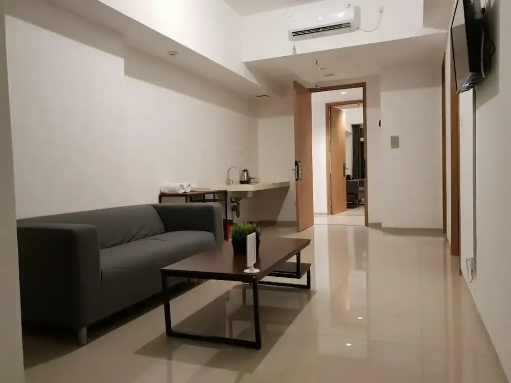 Alpine Room at TreePark City Apartement