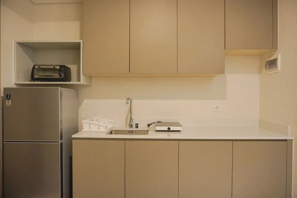 Modern Look And Comfortable 1Br Gold Coast Apartment Pik